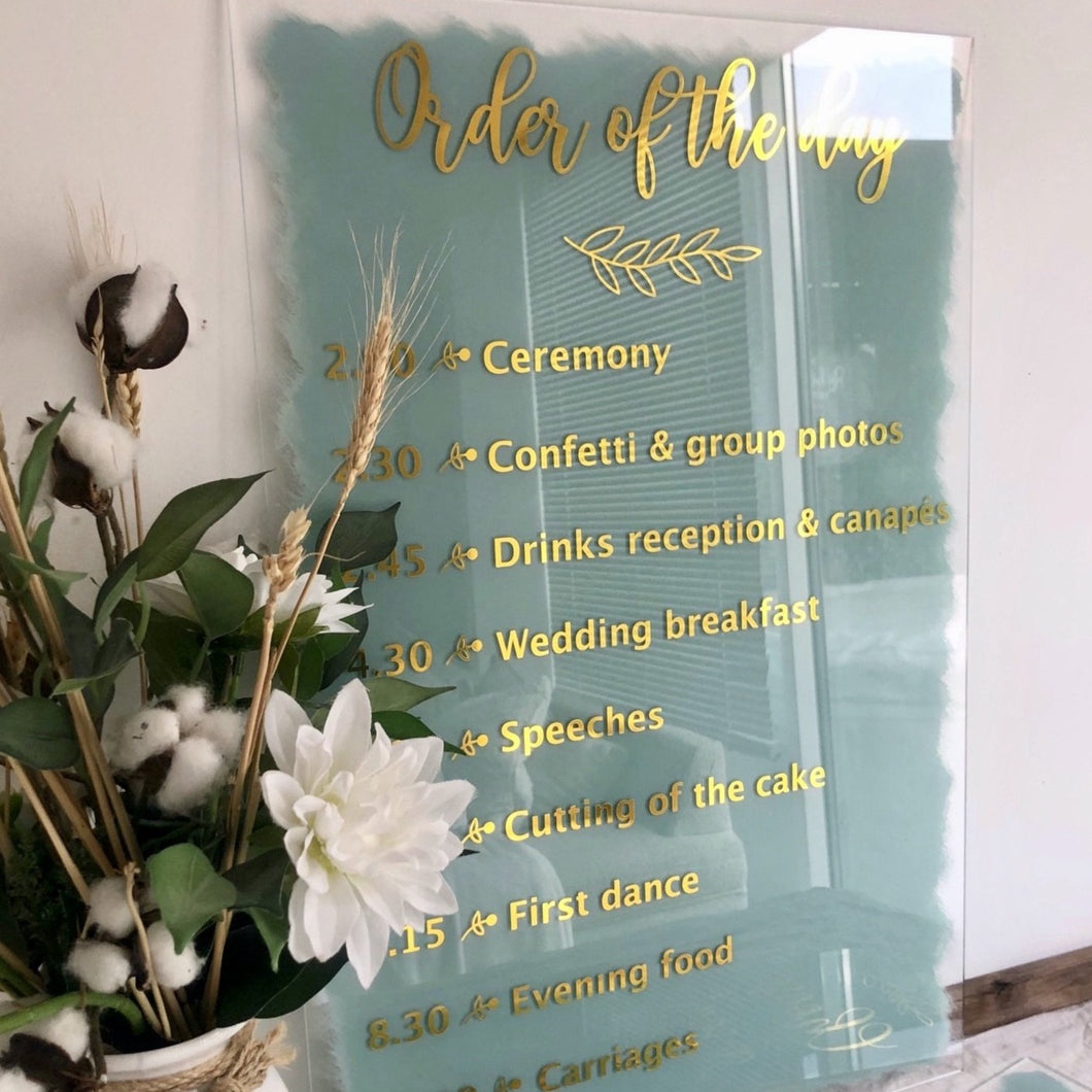 Order of the day acrylic wedding sign.